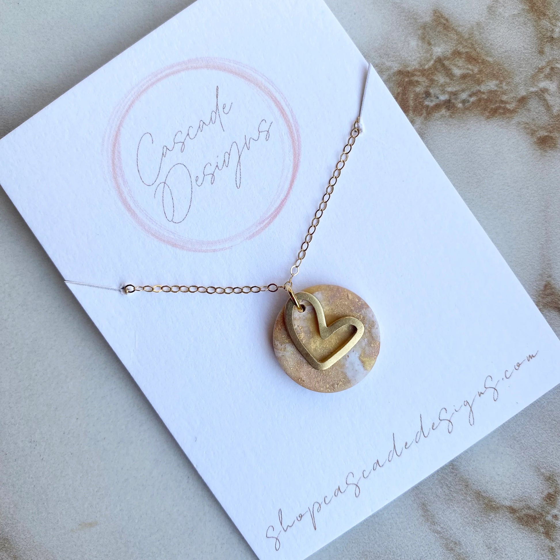 The Gold Amor | Round Heart Clay Necklace - GirlFriends Boutique