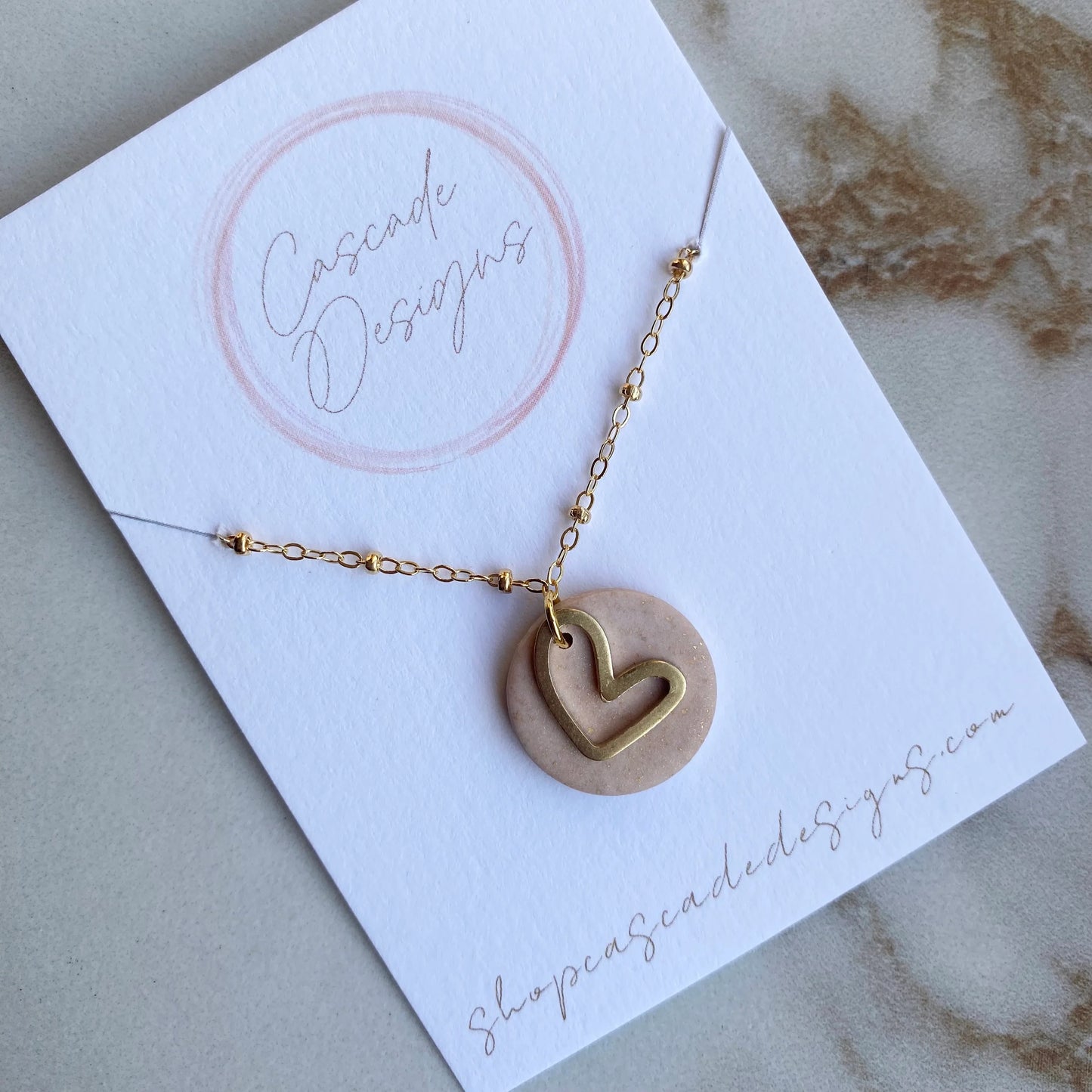 The Gold Amor | Round Heart Clay Necklace - GirlFriends Boutique